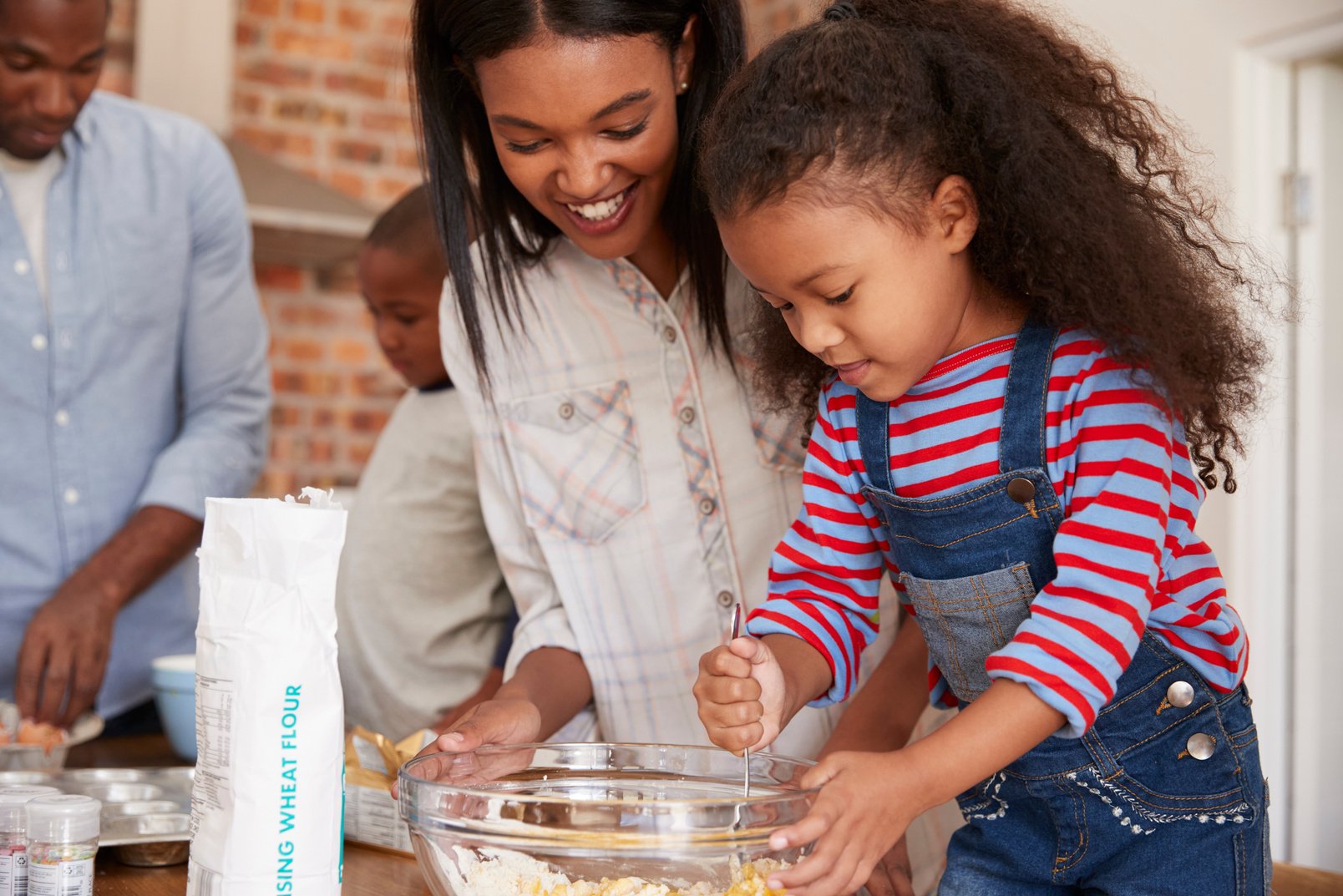 Parents and Children Baking Cakes